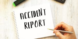 Filling out an accident report